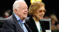 Former president Jimmy Carter and his wife Rosalynn look on as the Atlanta Falcons played against the Cincinnati Bengals on September 30, 2018, in Atlanta, Georgia