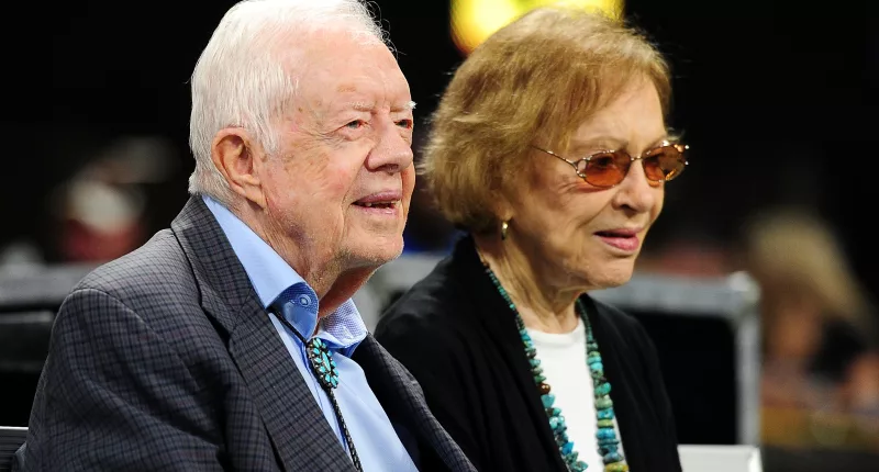 Former president Jimmy Carter and his wife Rosalynn look on as the Atlanta Falcons played against the Cincinnati Bengals on September 30, 2018, in Atlanta, Georgia