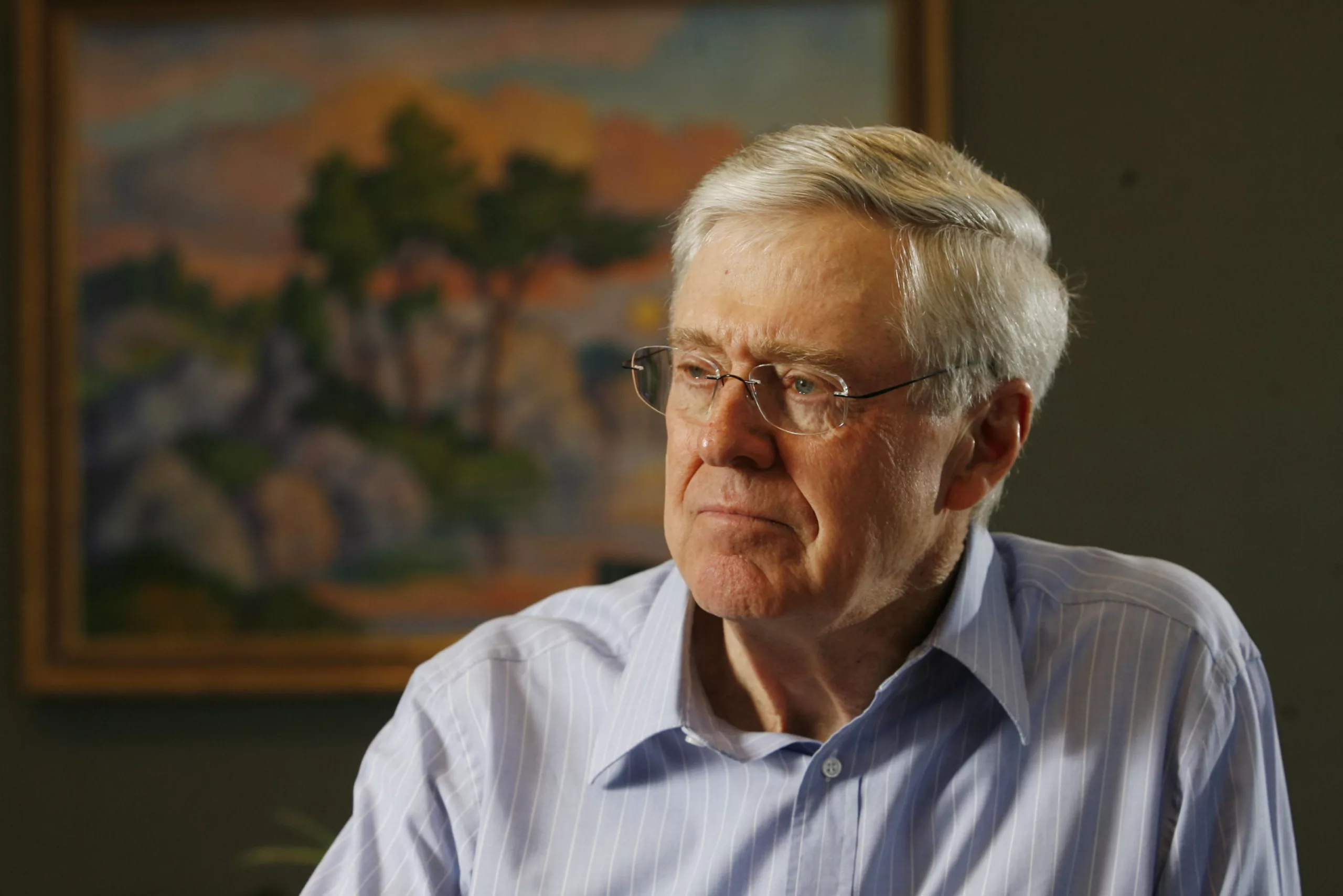 Charles Koch stands as the head of Koch Industries