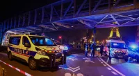 A BRIT has been injured and another tourist killed by a 'hammer-wielding attacker' near the Eiffel Tower in Paris