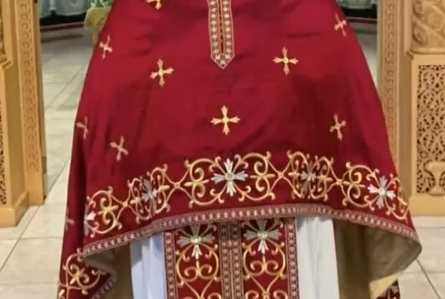 Father George Athanasiou was arrested after $117,000 went missing from a church