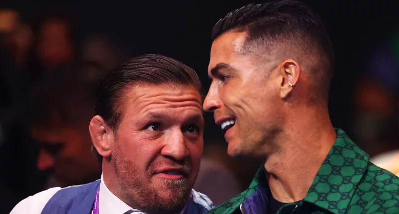 Cristiano Ronaldo sits next to Conor McGregor at Day of Reckoning