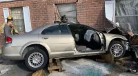 Driver crashes into Longwood psychic shop during card reading