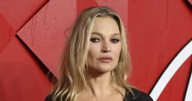Fashion Awards: Kate Moss flashes her long legs in flowing black gown