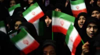 Female soccer fans in Iran allowed into Tehran stadium for men's game. FIFA head praises progress