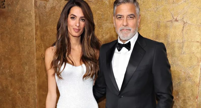 George Clooney thinks he is punching above his weight when it comes to his wife Amal