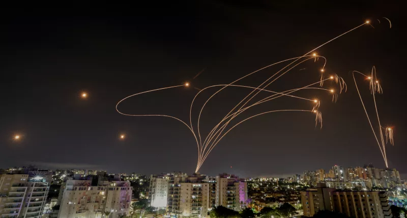 The attack overwhelmed Israel’s Iron Dome anti-missile system