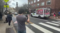 Harvard swarmed by truck billboards calling for president to resign in wake of UPenn fallout