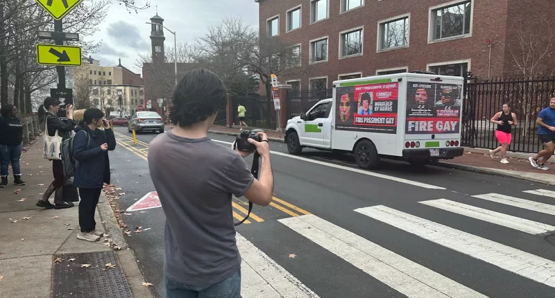 Harvard swarmed by truck billboards calling for president to resign in wake of UPenn fallout