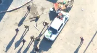 Drone footage released by the IDF allegedly shows Hamas terrorists raiding an aid truck and beating up a civilian