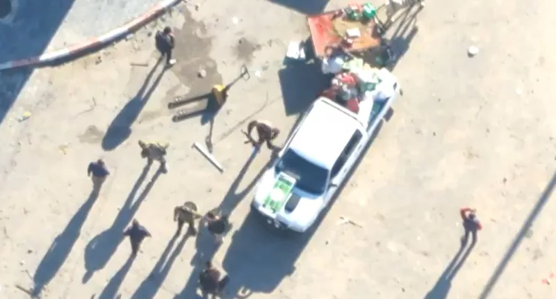 Drone footage released by the IDF allegedly shows Hamas terrorists raiding an aid truck and beating up a civilian