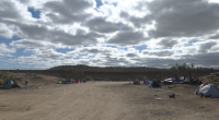 Migrant camps east of San Diego remain active as hundreds arrive daily