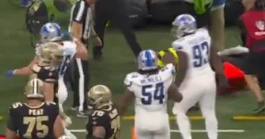NFL sideline worker appears to break his LEG on TV after collision