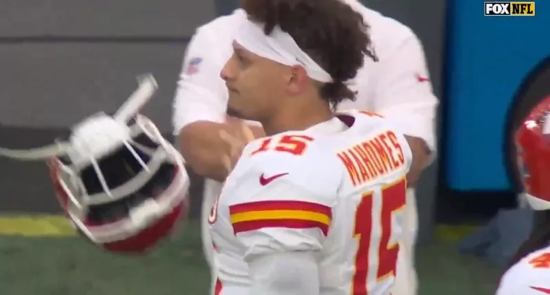 Patrick Mahomes tosses his helmet after interception