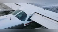 Pilot lands small plane on Minnesota lake, breaks through thin ice