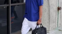 Powerball winner Edwin Castro's rival Jose Rivera opted for a blue Dodgers hat and matching T-shirt with bright sneakers for his court appearance