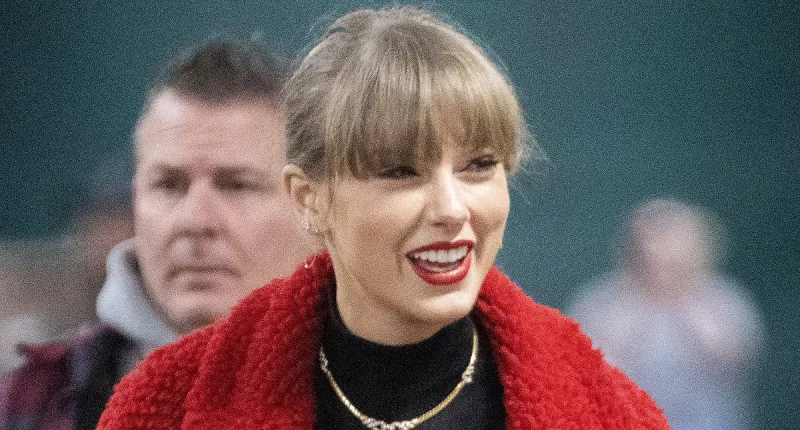 Taylor Swift borrows BFF Brittany Mahomes' red coat at Chiefs game