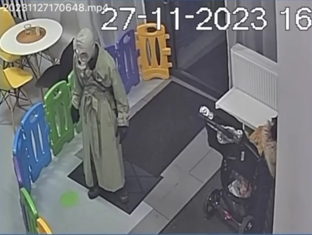 This is the terrifying moment a mystery figure wearing a gas mask walked into a kids play centre