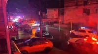 Three people are stabbed to death and two cops are slashed in Queens