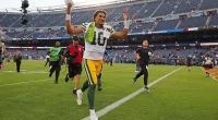Jordan Love celebrates after a win against the Chicago Bears
