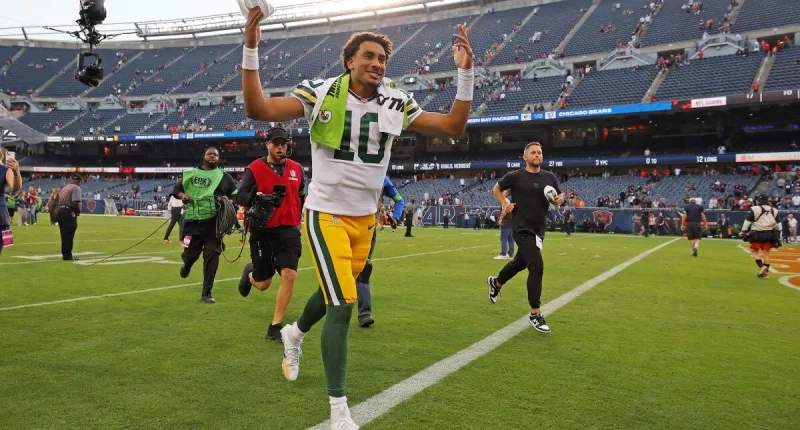 Jordan Love celebrates after a win against the Chicago Bears