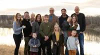 Senator Kevin Cramer (center) poses for a photo with his wife, children, and grandchildren
