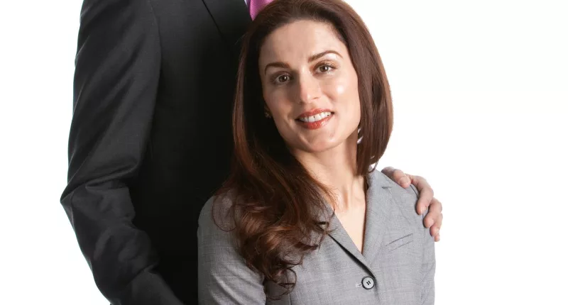 Teena and Rakesh Kamal pose for a photo together in 2012