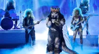 Husky singing on stage in