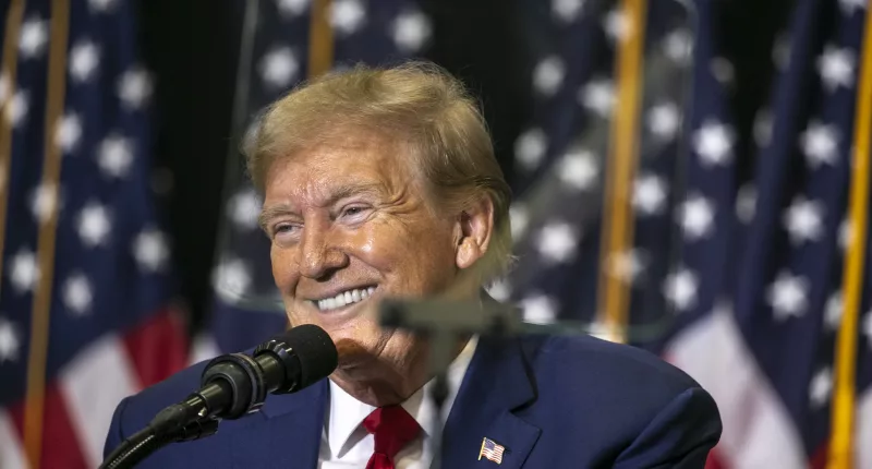 Donald Trump speaks during a caucus event on December 2, 2023, at Kirkwood Community College in Cedar Rapids, Iowa