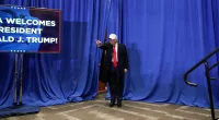 Republican presidential candidate former President Donald Trump arrives to speak at a rally at Simpson College in Indianola, Iowa, Sunday, Jan. 14, 2024. (AP Photo/Andrew Harnik)