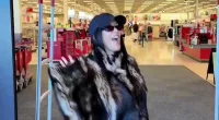 Kourtney Kardashian camouflages post-baby body in fur jacket at Target