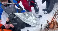 New video shows moments snowmobilers rescued man buried by avalanche in Utah