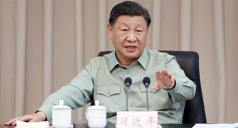 Chinese President Xi Jinping delivering a speech at the Navy HQ of the People’s Liberation Army