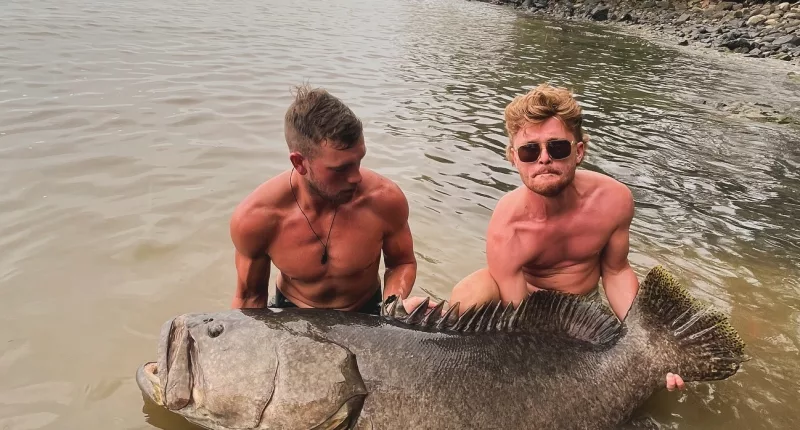 Harry Thomas (left) and Ed Hirst caught the monster fish in Port Douglas, Queensland