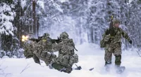 Royal Marines were among those put through a brutal week of training during which they were taught to escape after falling into a frozen lake or river.