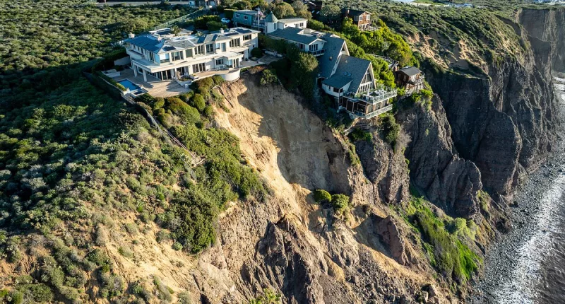 California clifftop mansions stand on the brink after severe storms