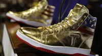 Fox commentator Raymond Arroyo sparks fury by claiming Trump's gold high tops will help win the black vote because 'they love sneakers'