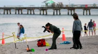 Girl buried alive while digging sand hole in Florida, brother injured