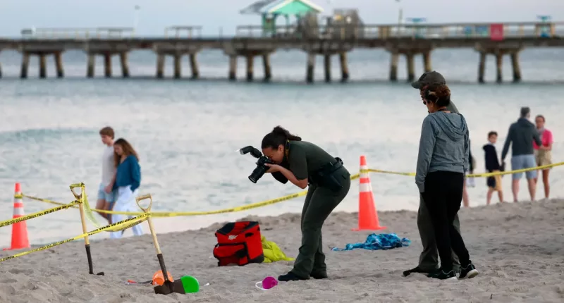 Girl buried alive while digging sand hole in Florida, brother injured