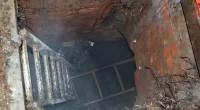 A gang spent months digging a secret tunnel under a car park andinto Blockbuster Video