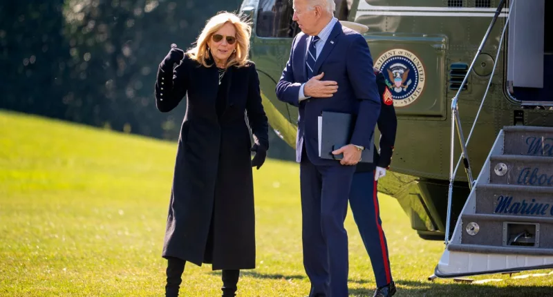 President Joe Biden , right, and first lady Jill Biden arrive at the White House in Washington, Monday, Feb. 19, 2024, after returning from Rehoboth Beach, Del. (AP Photo/Andrew Harnik)