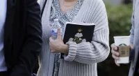 Socialite Rebecca Grossman, seen walking into court with her husband on Wednesday, stands accused of killing two young boys in a fatal hit-and-run