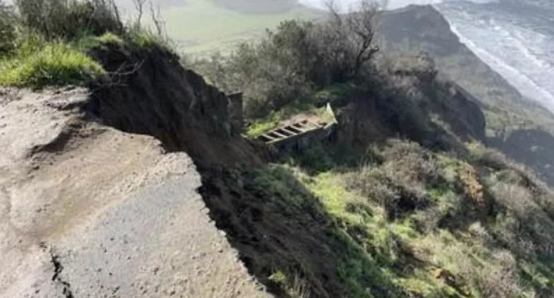 People flee cliffside parking lot as it crashes into ocean