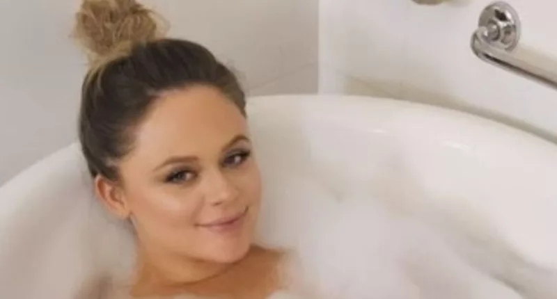 Pregnant Emily Atack displays bare baby bump as she strips down for risqué bath snap