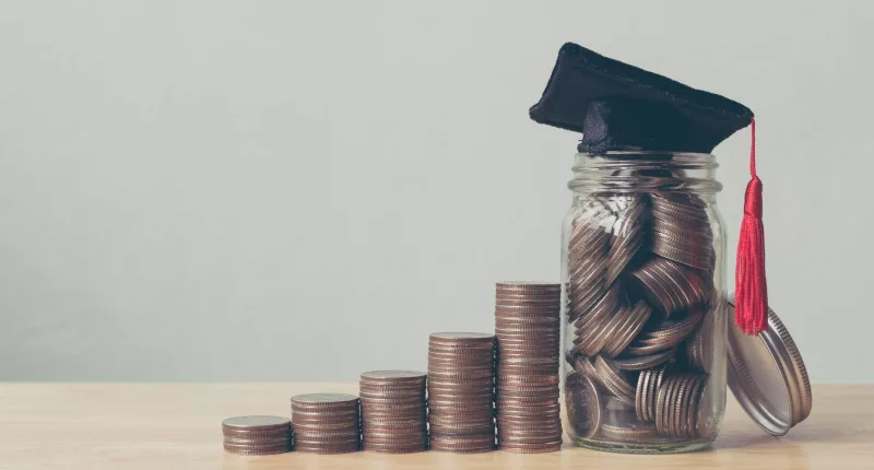 coins, jar filled with coins and a cap