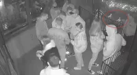 This is the moment Putin's gun-wielding thugs entered the cafe