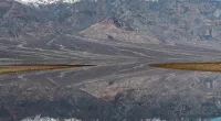 Storms create temporary LAKE at California hot spot