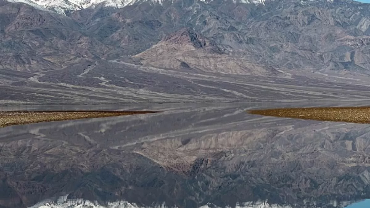 Storms create temporary LAKE at California hot spot