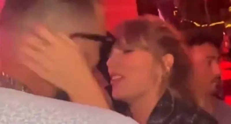 Taylor Swift and Travis Kelce share a kiss to her song 'Love Story'