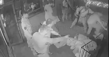 Terrifying moment 'drunk' Russian troops storm café in occupied Crimea
